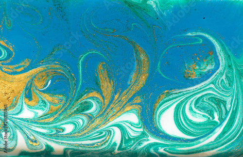 Blue  green and gold marbling pattern. Golden powder marble liquid texture.