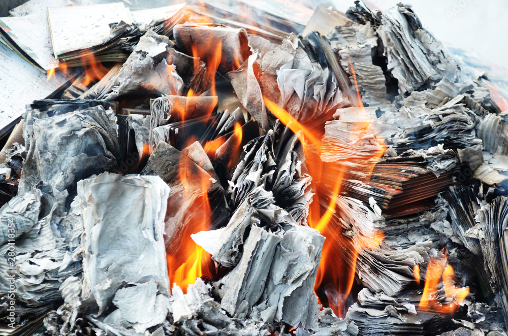 The fire is caused by burning paper. Destruction of confidential documents or not