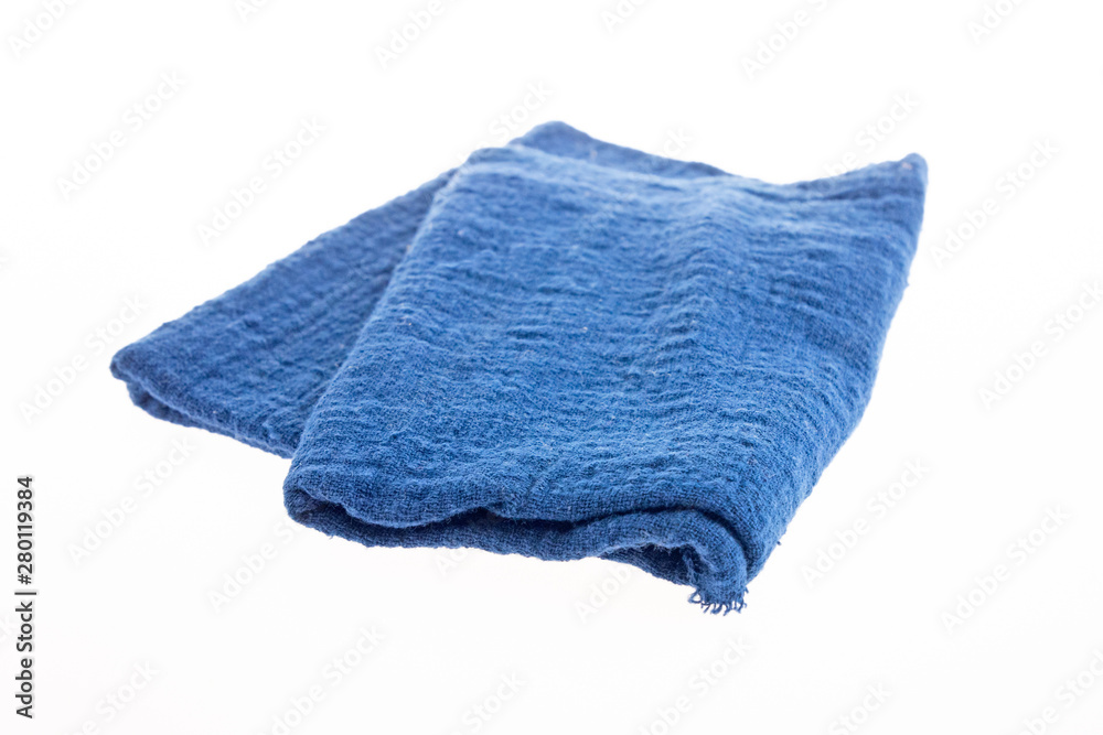 Blue cotton napkins, isolated on a white background Blue cotton napkins, isolated on a white background