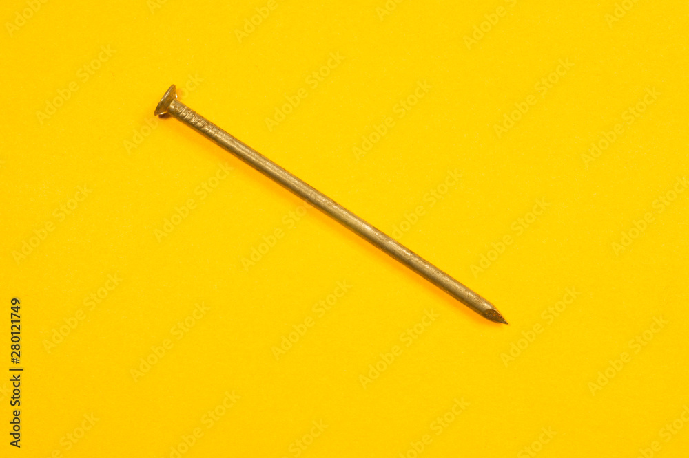 Nails on a yellow background Nails on a yellow background