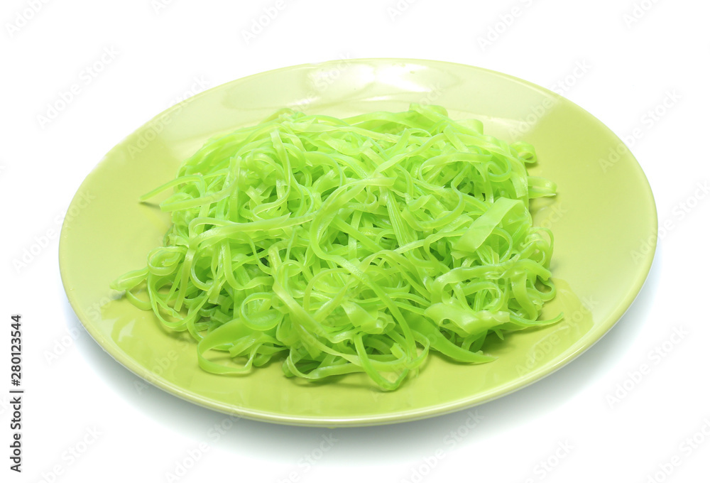 green noodles on dish isolated on white background green noodles on dish isolated on white background