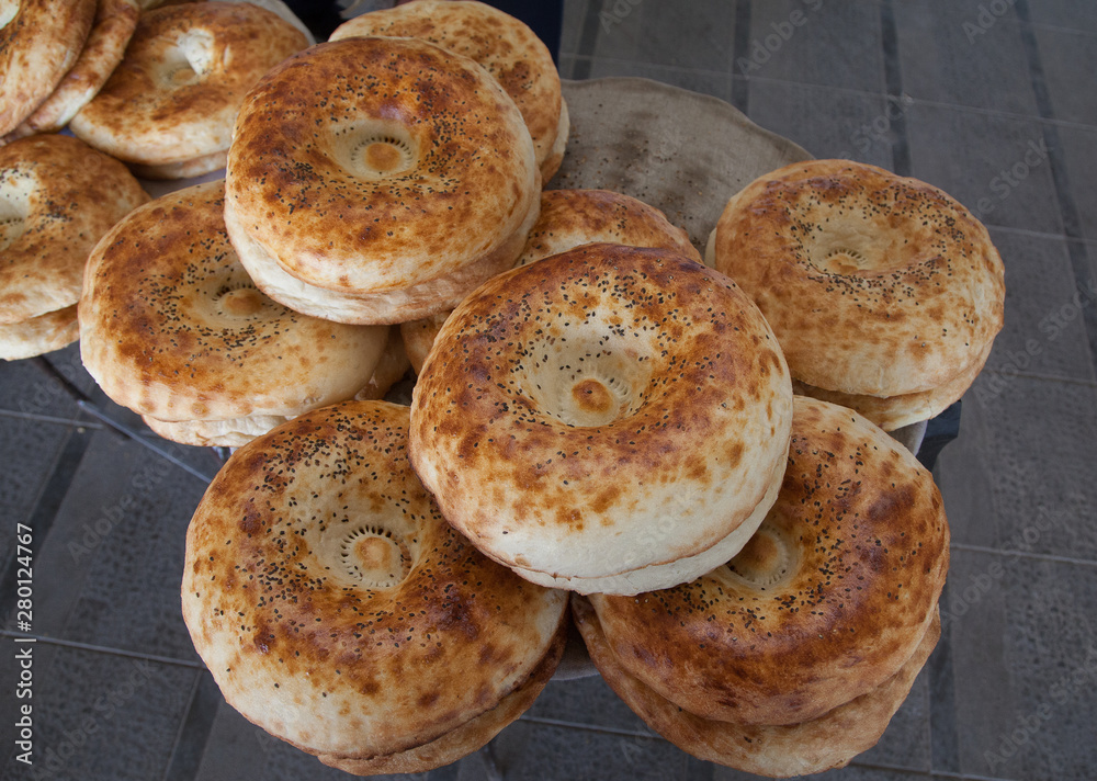 Uzbek flatbreads from tandoor top view close-up, horizontally. Uzbek flatbreads from tandoor top view close-up, horizontally.