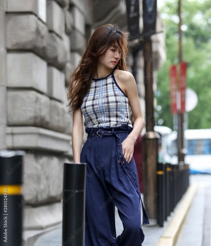Asian fashion girl on the street in Shanghai