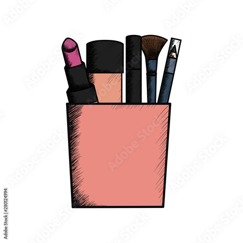 set of make up brushes and lipstick in box photo