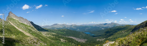 Panorama of the Western Sayan Mountains. View in the Siberian natural park Ergaki. Summer sunny day