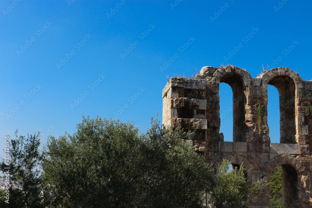 View to the ruins of The famous Herod Atticus Odeon in Acropolis of Athens greece
