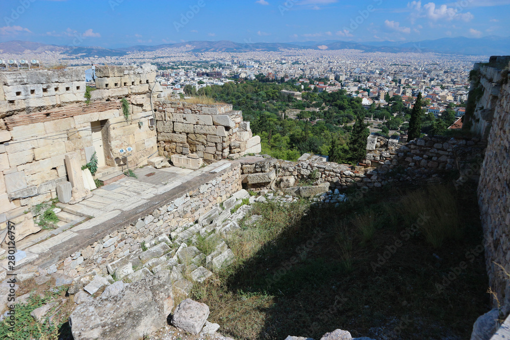 View to the city of Athens and ancient ruins of famous landmark acropolis