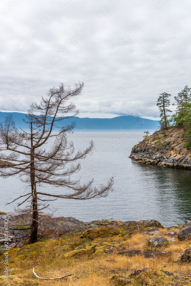 View over Inlet, ocean and island with mountains in beautiful British Columbia. Canada. View over Inlet, ocean and island with mountains in beautiful British Columbia. Canada.