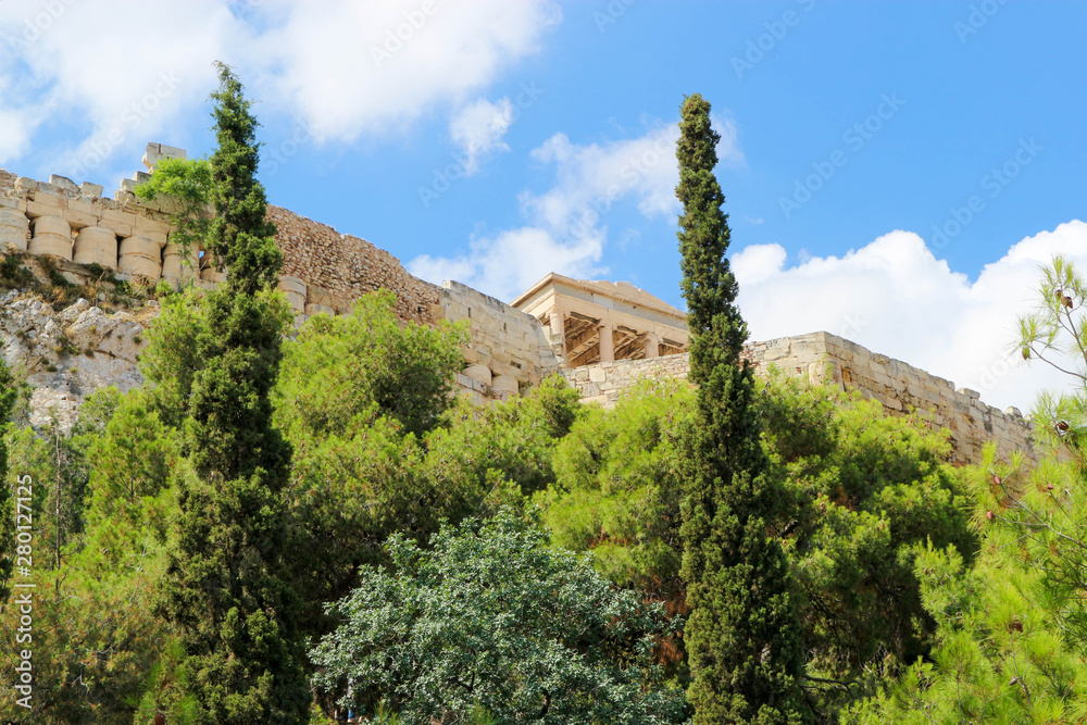 View to Acropolis of Athens from below with blue sky on the background