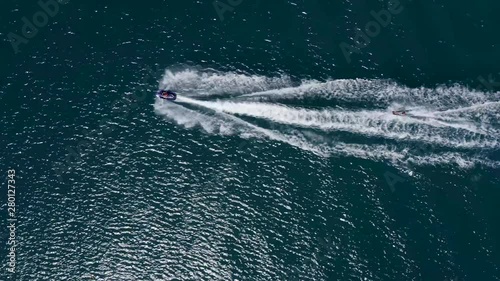 Wallpaper Mural AERIAL directly above jet ski towing a male water skier Torontodigital.ca