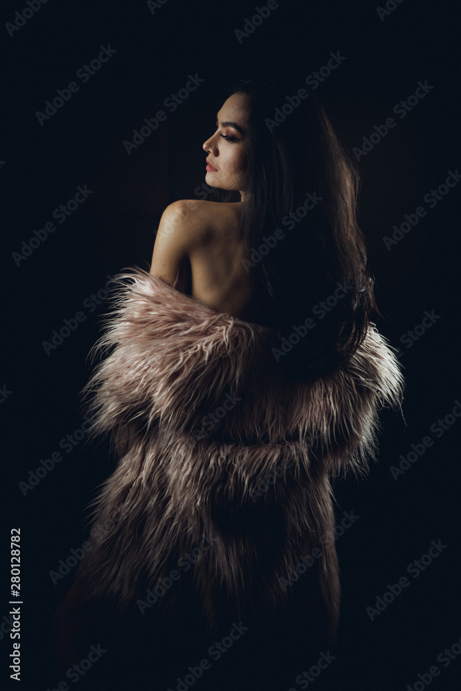 Sexy woman body - studio shot/Portrait of a beautiful woman with black hair, isolated on a dark gray background Attractive Asian fashion styles/ Sexy woman body - studio shot/Portrait of a beautiful woman with black hair, isolated on a dark gray background Attractive Asian fashion styles/