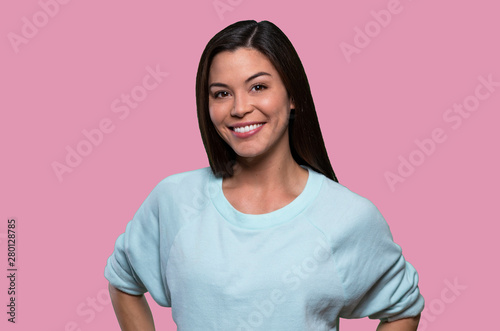All natural asian american mixed ethnicity asian female with friendly smile, olive skin and dark hair
