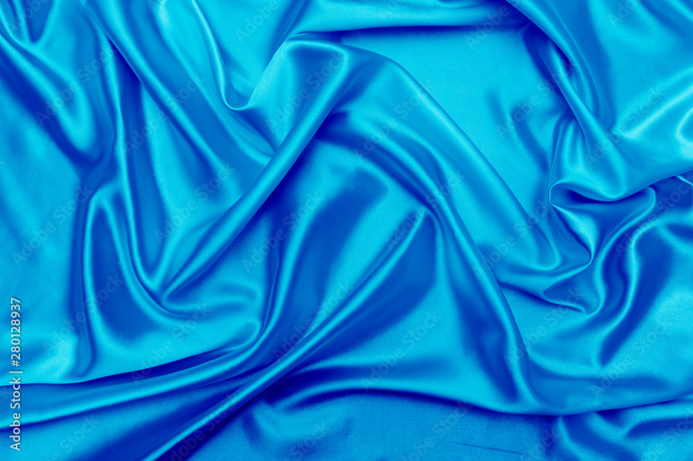 Obraz premium Blue satin fabric texture background