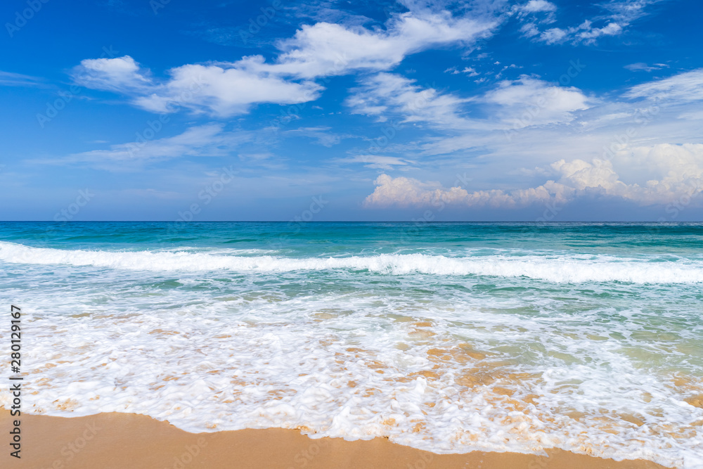 Beautiful tropical beach with blue sky and white clouds abstract texture background. Copy space of summer vacation and holiday business travel concept.