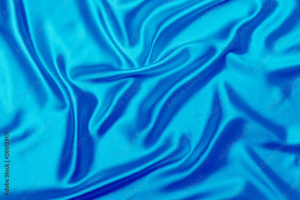 Blue satin fabric texture background Blue satin fabric texture background