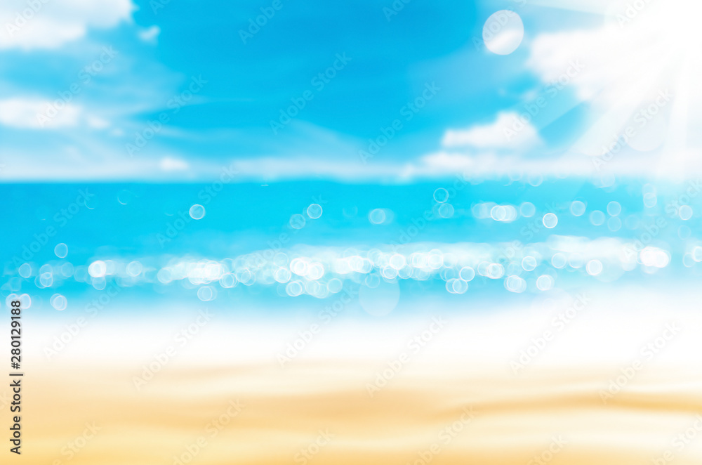 Blur tropical beach with bokeh sun light wave abstract background. Blur tropical beach with bokeh sun light wave abstract background.