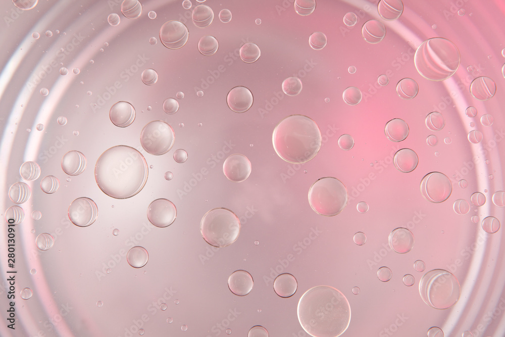 oil floating on colouring water oil floating on colouring water
