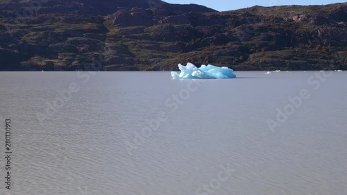 Floating iceberg from galciar grey at Grey lake in Torres del Paine National Park photo