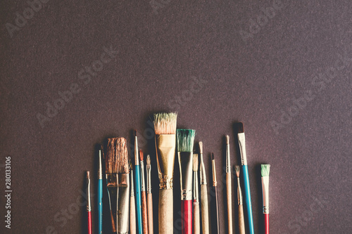 Painting brushes on background.