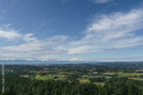 Aerial panoramic view of the city of Victoria from mount Douglas park with a beautiful Pacific Ocean scene.
