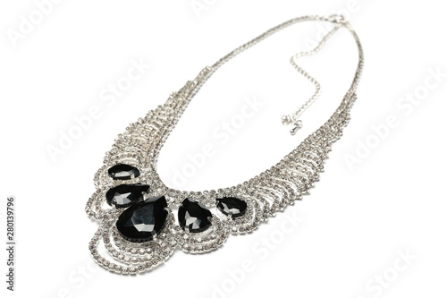 Stylish necklace with gemstones isolated on white. Luxury jewelry