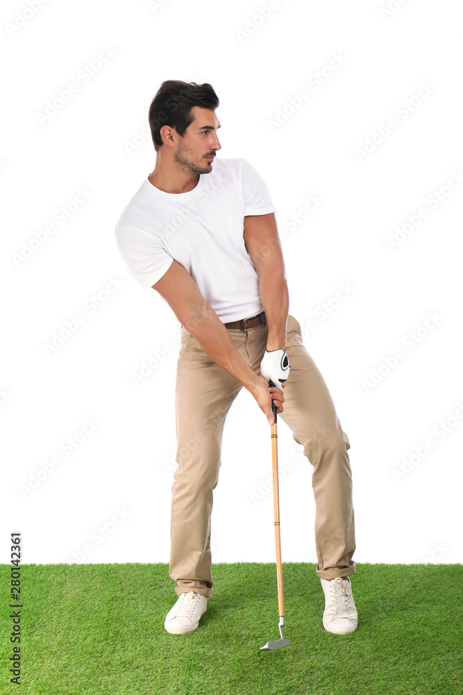 Fototapeta premium Young man playing golf on white background