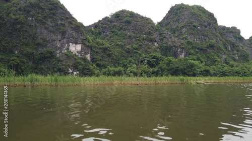 Navigating the river in Tamcoc photo