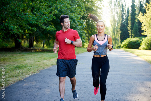 Fototapeta Naklejka Na Ścianę i Meble -  Running with partner make it is more pleasure