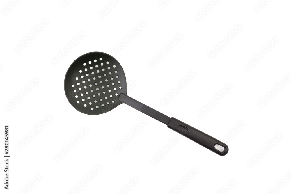 Black kitchen spatula utensils or kitchenware closeup isolated on white background Black kitchen spatula utensils or kitchenware closeup isolated on white background