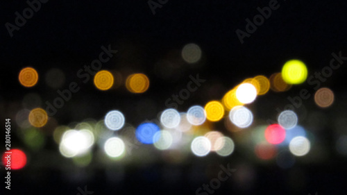 City lights blurred abstract background. night time city with colorful light. © eliyashevskiy