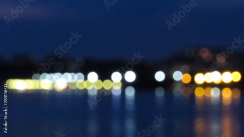 City lights blurred abstract background. night time city with colorful light.