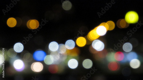 City lights blurred abstract background. night time city with colorful light.