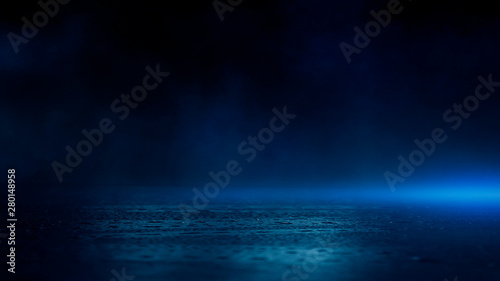 Obraz na plátne Wet asphalt, reflection of neon lights, a searchlight, smoke