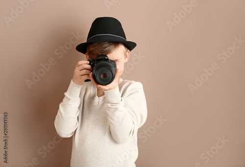 Cute little photographer wi...