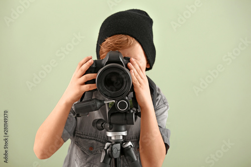 Cute little photographer wi...