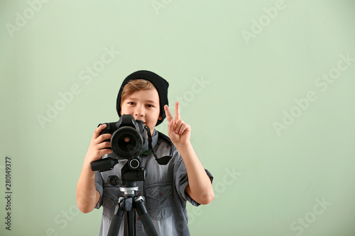 Cute little photographer wi...