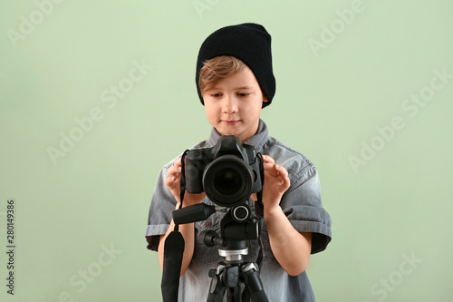 Cute little photographer wi...