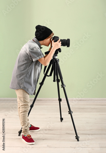 Cute little photographer wi...