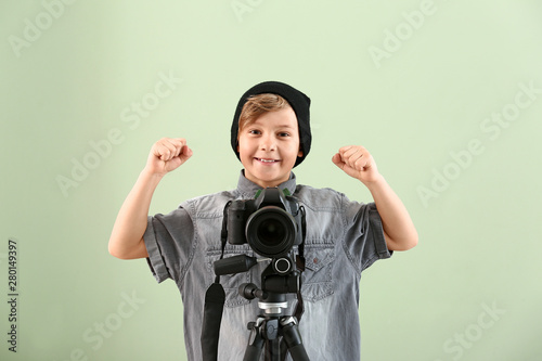 Cute little photographer wi...