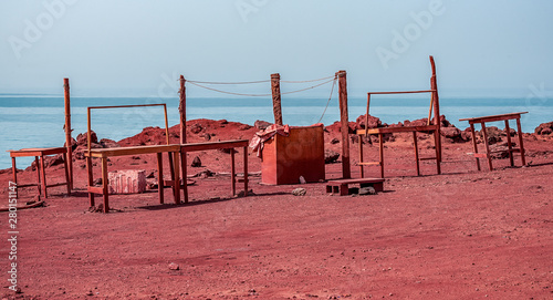 Unbeatable view of Red Beach of hormuz near Mofannagh beach with incredibly red sand on the Persian Gulf coast on the Iranian island of Hormuz