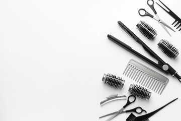 Set of hairdresser tools and accessories on white background