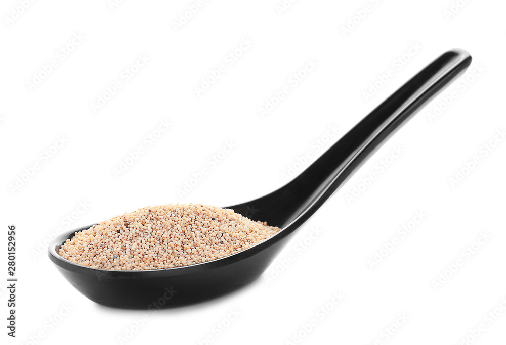 Spoon with poppy seeds on white background Spoon with poppy seeds on white background