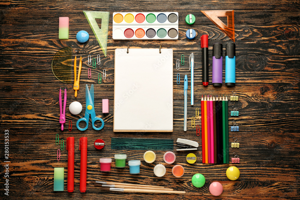 Different school stationery on wooden background Different school stationery on wooden background