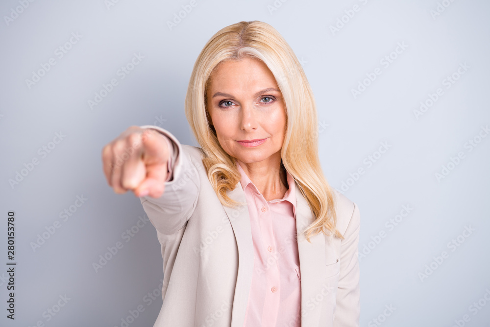 Close-up portrait of her she nice attractive stylish content wavy-haired lady bossy arrogant expert pointing forefinger at you isolated on light white gray pastel background Close-up portrait of her she nice attractive stylish content wavy-haired lady bossy arrogant expert pointing forefinger at you isolated on light white gray pastel background