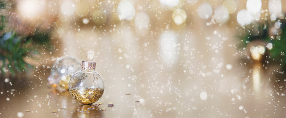 Christmas decoration on abstract gold background, close up