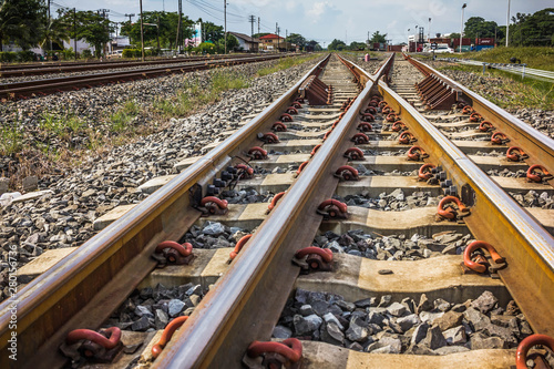 Two railway tracks merge together.