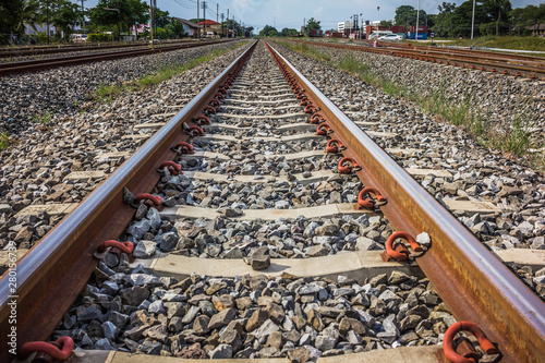 Two railway tracks merge together.