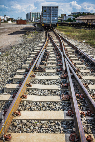 Two railway tracks merge together.
