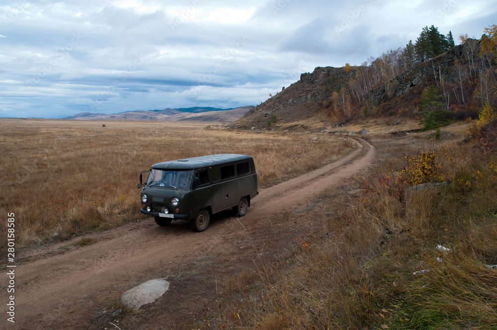 Barguzin Valley Russia, Russian off-road van on remote valley road