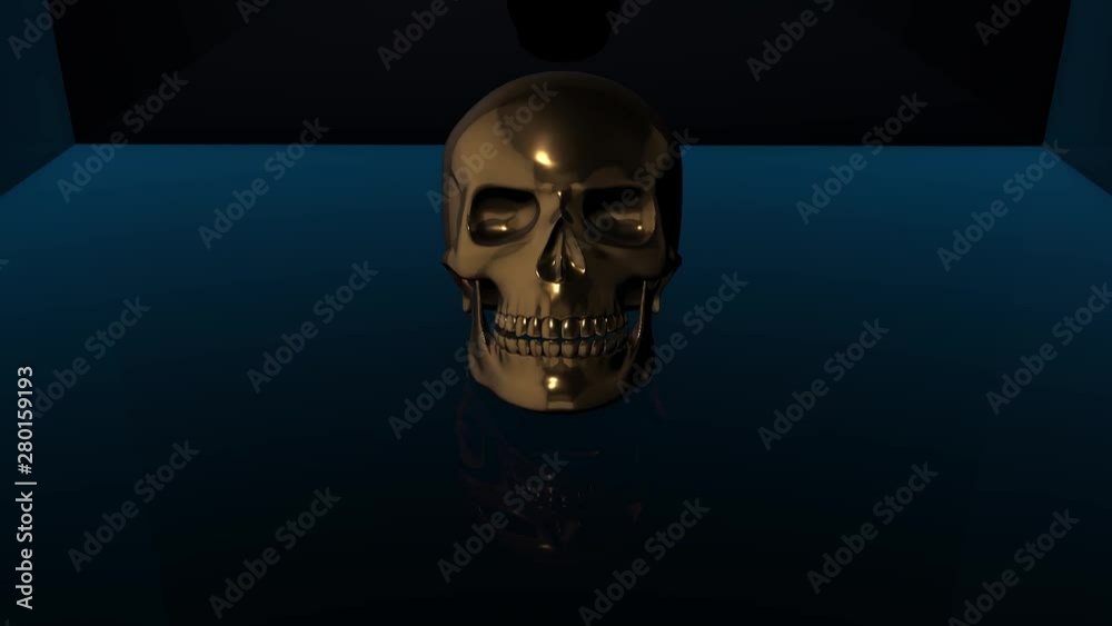 A gold human skull inside a small glowing blue reflective room. A gold human skull inside a small glowing blue reflective room.